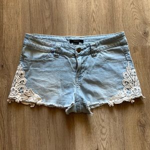 Light wash jean with lace shorts